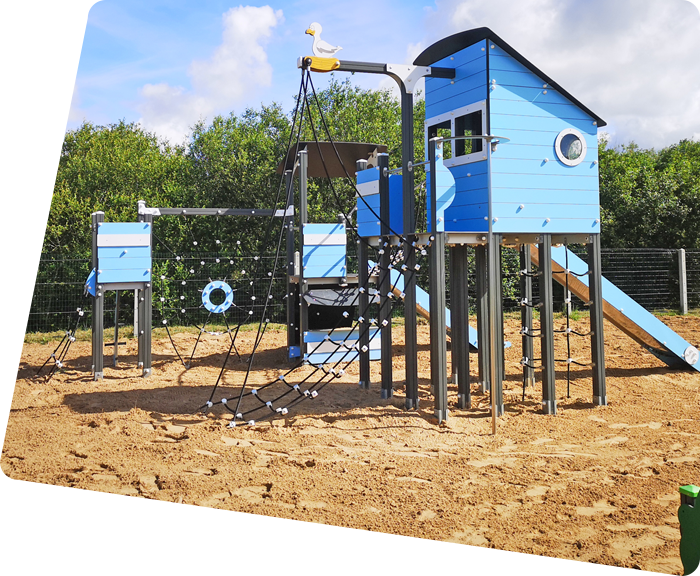 Blue play structure on the playground of La Prairie campsite in Saint-Hilaire