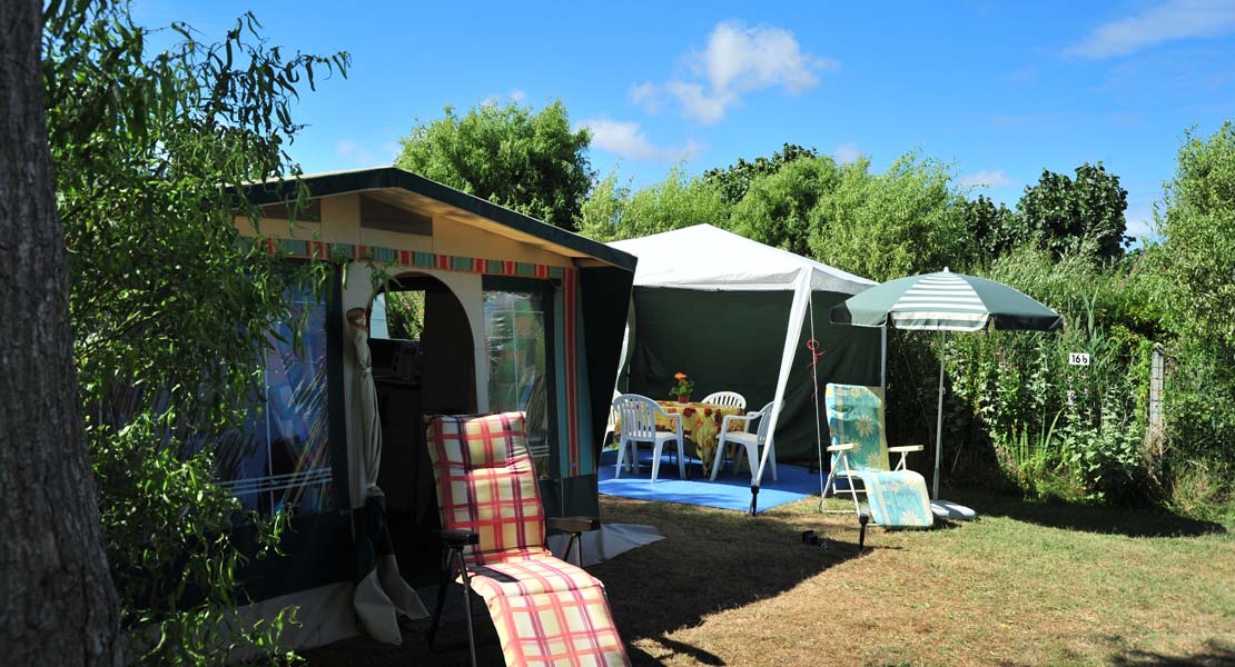 Terrace and gazebo on a campsite near the beaches in Vendée