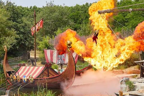 Viking show with drakkar and fire at Puy du Fou in Vendée