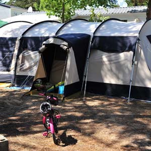 Tents on a shaded tent camping pitch in Saint-Hilaire 85