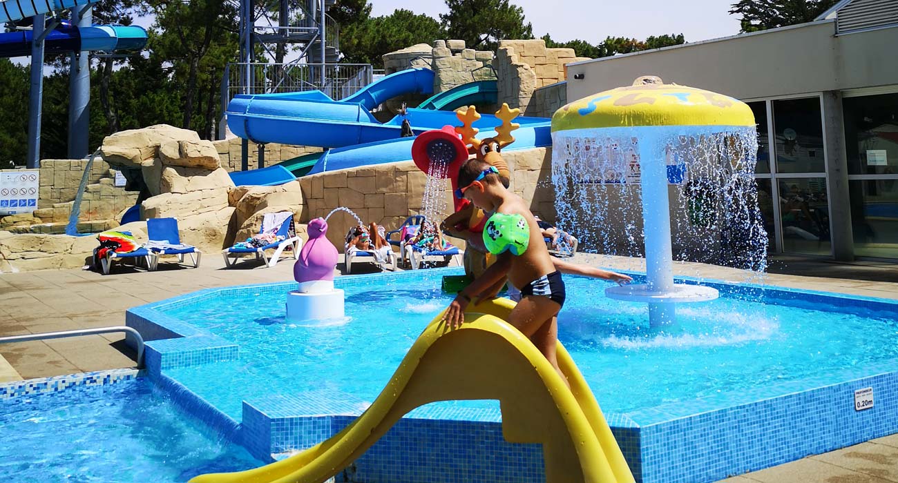 Outdoor paddling pool at Le Clos des Pins campsite in Vendée