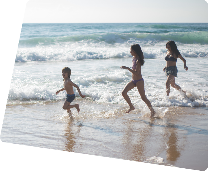 Children at the beach by the sea near the campsite in Saint-Hilaire