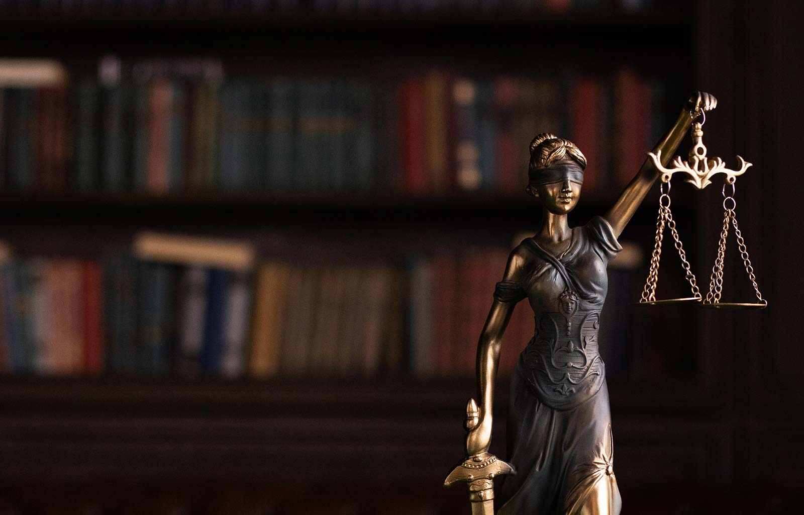 Statute symbolizing justice in front of a library in Vendée